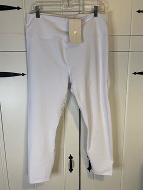 Fabletics High-Waisted Power hold, All-Way Stretch Leggings in Classic White.